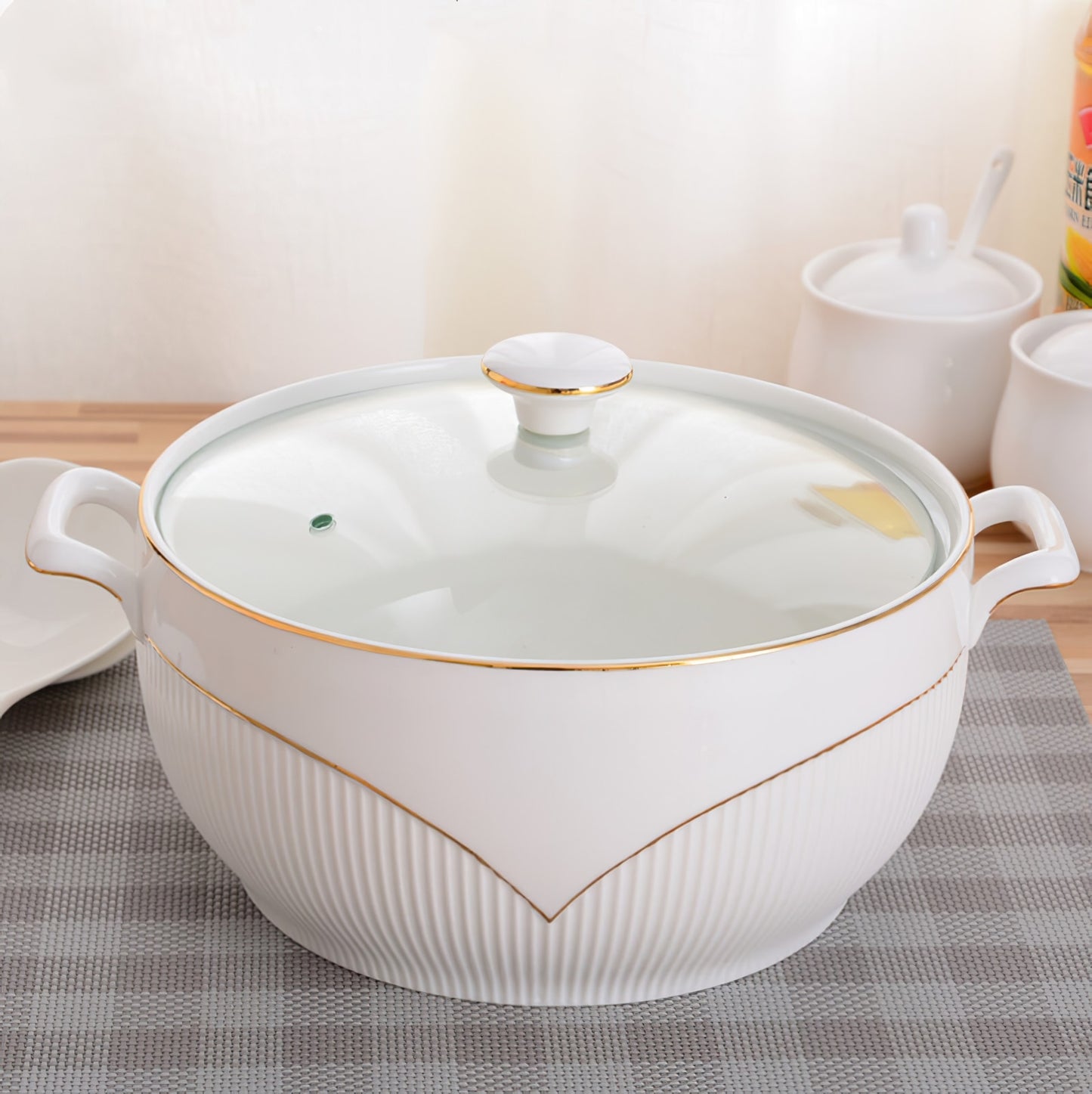 Discover versatility with our Ceramic Soup Pot – an essential component of the best dining set in Australia. Elevate your dining experience with this meticulously crafted soup pot, seamlessly complementing your plates and bowls ensemble. Ideal for serving soups and stews, its timeless design enhances the overall aesthetic of your table. Enjoy sophistication in every culinary moment with the best dinnerware collection.