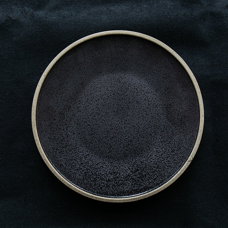 Elevate your table setting with the Charcoal Charms Dinner Plate – a captivating addition to the best dinnerware set in Australia. This versatile piece complements your dining ware, featuring a mesmerizing charcoal design that adds contemporary elegance. Perfect for serving dishes, this black dinnerware set blends style and functionality seamlessly. Indulge in the charm of Charcoal Charms for a dining experience to remember.