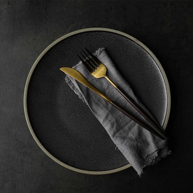 Elevate your table setting with the Charcoal Charms Dinner Plate – a captivating addition to the best dinnerware set in Australia. This versatile piece complements your dining ware, featuring a mesmerizing charcoal design that adds contemporary elegance. Perfect for serving dishes, this black dinnerware set blends style and functionality seamlessly. Indulge in the charm of Charcoal Charms for a dining experience to remember.