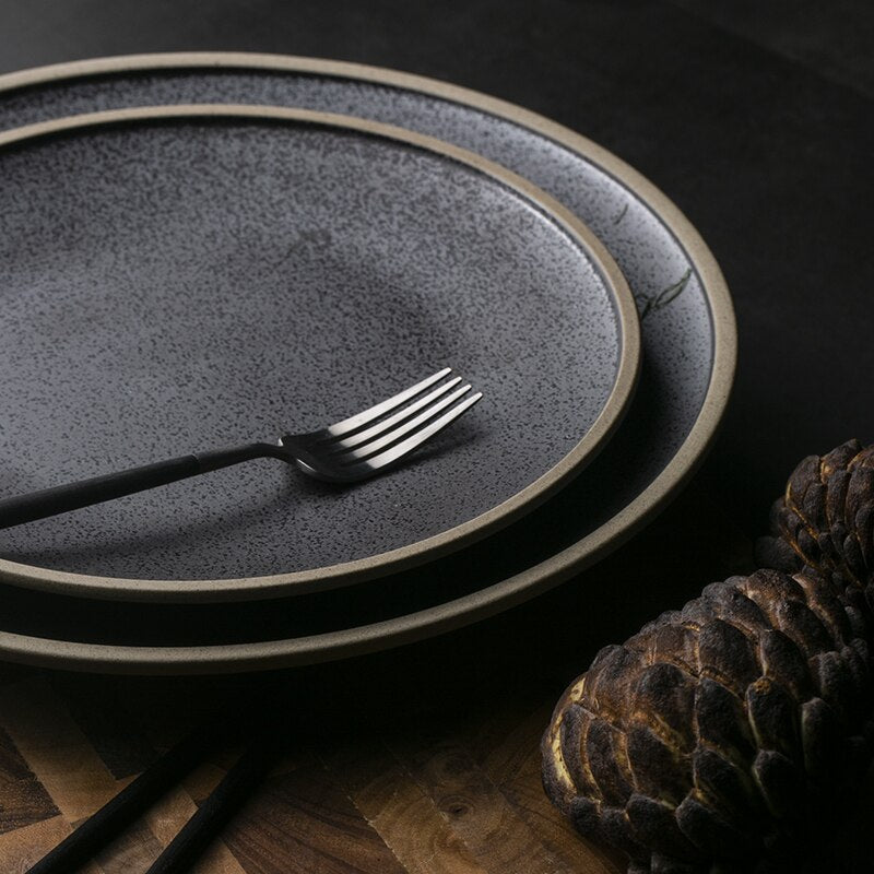 Elevate your table setting with the Charcoal Charms Dinner Plate – a captivating addition to the best dinnerware set in Australia. This versatile piece complements your dining ware, featuring a mesmerizing charcoal design that adds contemporary elegance. Perfect for serving dishes, this black dinnerware set blends style and functionality seamlessly. Indulge in the charm of Charcoal Charms for a dining experience to remember.