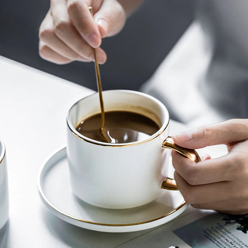 A Ceramic Latte Mug Set featuring four generously sized mugs, each with a smooth, glossy finish and ergonomic handle. Made from durable, high-quality ceramic, these mugs retain heat to keep beverages warm longer. Ideal for both casual and formal settings, and are dishwasher and microwave safe for easy cleaning. Perfect for enjoying lattes, cappuccinos, and other hot drinks in style.