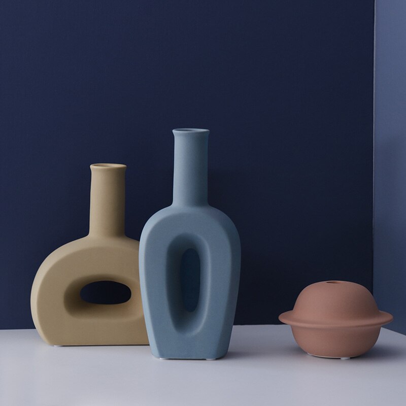 Discover the best home decor in Australia with our Ceramic Vase. Infuse your space with pastel colors, embracing an aesthetic and minimalist decor. This elegant piece effortlessly enhances your interior, offering a perfect blend of simplicity and charm.