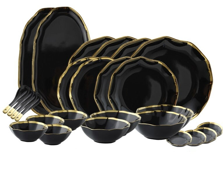 Introducing our Dinnerware Elegance Set, a modern and sleek collection in classic black. This stylish ensemble includes plates and bowls, complete with flatware and serving dishes, elevating your dining experience. The deep black hue adds drama to your table, making it perfect for both casual and formal occasions. Upgrade your table setting with the sophistication of the Dinnerware Elegance Set – where style meets practicality. Black dinnerware set in Australia