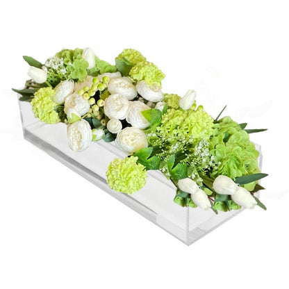 A modern, transparent Acrylic Flower Vase displaying a beautiful arrangement of flowers, seamlessly blending elegance with contemporary design in The lime shop with the best Home accessories in Australia.