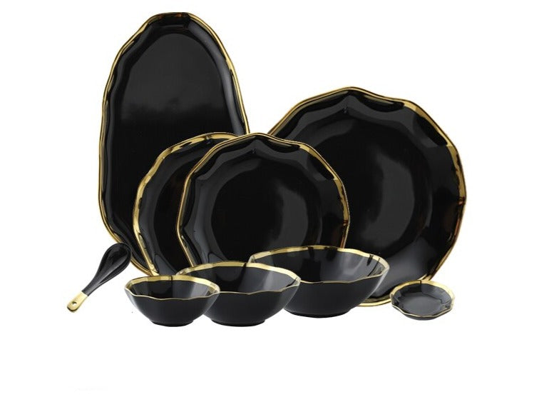 Introducing our Dinnerware Elegance Set, a modern and sleek collection in classic black. This stylish ensemble includes plates and bowls, complete with flatware and serving dishes, elevating your dining experience. The deep black hue adds drama to your table, making it perfect for both casual and formal occasions. Upgrade your table setting with the sophistication of the Dinnerware Elegance Set – where style meets practicality. Black dinnerware set in Australia