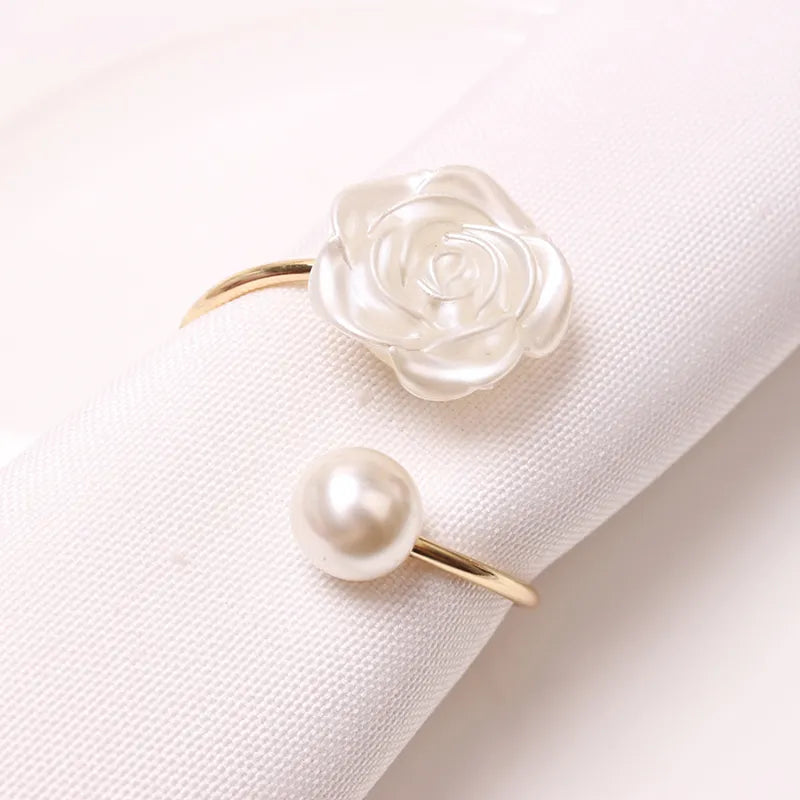 Alloy Pearl Rose Napkin Rings: Elevate your dining experience with these luxurious tableware accents featuring an exquisite rose design and lustrous pearls, perfect for adding timeless elegance to any setting.