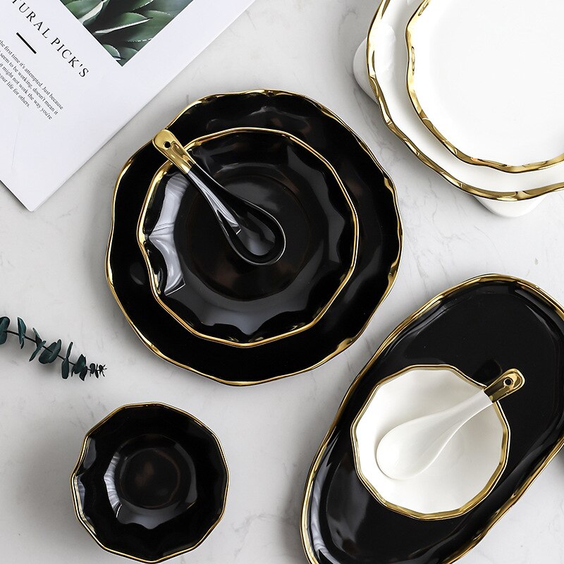 Introducing our Dinnerware Elegance Set, a modern and sleek collection in classic black. This stylish ensemble includes plates and bowls, complete with flatware and serving dishes, elevating your dining experience. The deep black hue adds drama to your table, making it perfect for both casual and formal occasions. Upgrade your table setting with the sophistication of the Dinnerware Elegance Set – where style meets practicality. Black dinnerware set in Australia