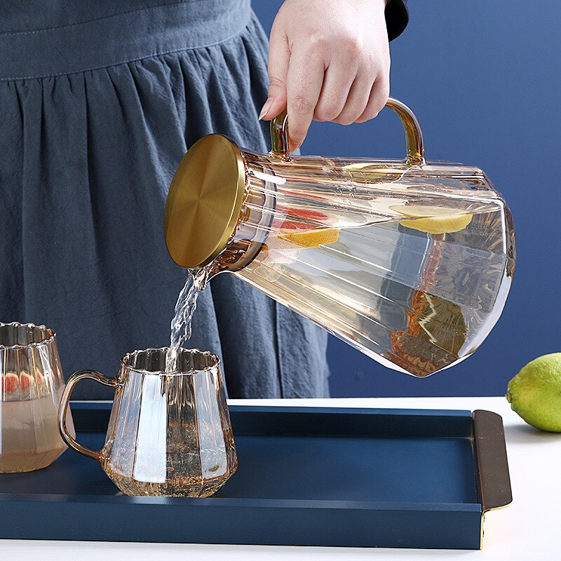 Amber Glass Kettle and Cups Set: Elevate your beverage experience with this stylish glass set, featuring a transparent kettle for a captivating view and matching cups, crafted from high-quality amber glass for a perfect blend of aesthetics and functionality in Sydney.