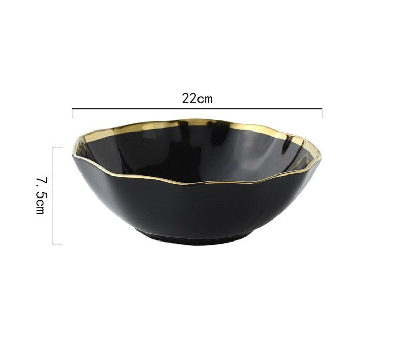 Introducing our Dinnerware Elegance Set, a modern and sleek collection in classic black. This stylish ensemble includes plates and bowls, complete with flatware and serving dishes, elevating your dining experience. The deep black hue adds drama to your table, making it perfect for both casual and formal occasions. Upgrade your table setting with the sophistication of the Dinnerware Elegance Set – where style meets practicality. Black dinnerware set in Australia