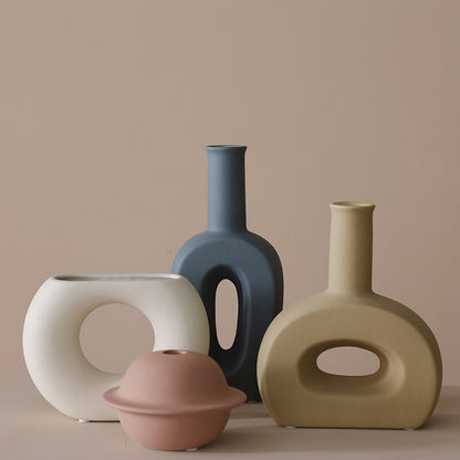 Discover the best home decor in Australia with our Ceramic Vase. Infuse your space with pastel colors, embracing an aesthetic and minimalist decor. This elegant piece effortlessly enhances your interior, offering a perfect blend of simplicity and charm.