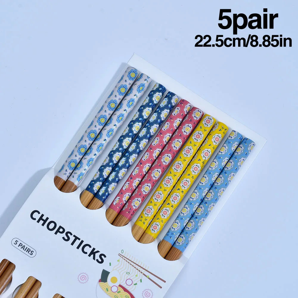 A set of high-quality wooden chopsticks featuring Korean and Chinese designs, perfect for authentic dining experiences. Available at The Lime Kitchen online shop.