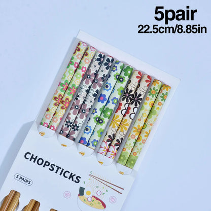 A set of high-quality wooden chopsticks featuring Korean and Chinese designs, perfect for authentic dining experiences. Available at The Lime Kitchen online shop.