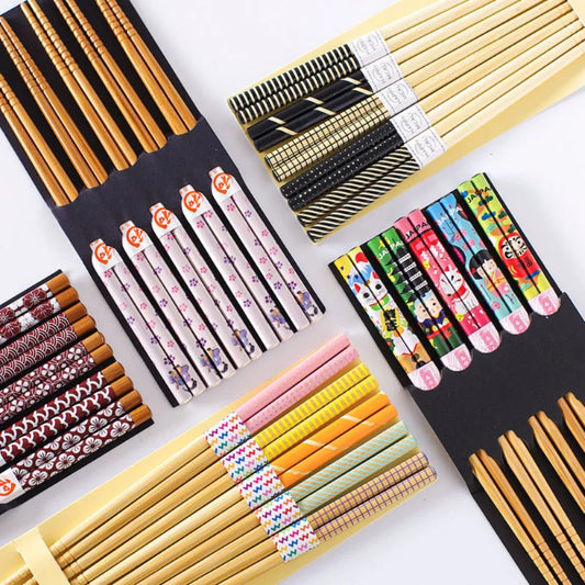 A set of high-quality wooden chopsticks featuring Korean and Chinese designs, perfect for authentic dining experiences. Available at The Lime Kitchen online shop.