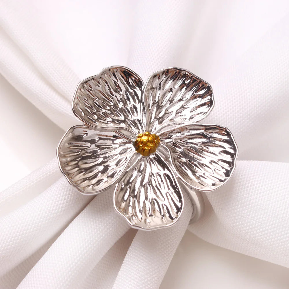 Silver Blossom Napkin Ring: A luxurious and intricate tableware accessory, perfect for elevating your dining experience with style and dinnerware sophistication.