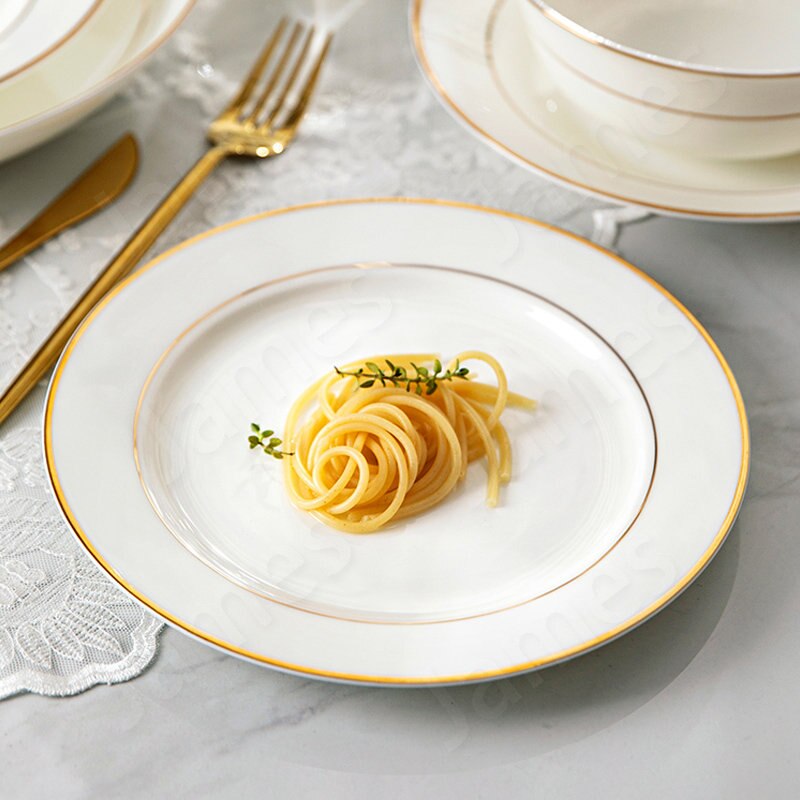 Explore the elegance of our best dinnerware set in Australia - a stunning white and gold collection featuring plates, bowls, and a versatile dinner set. This kitchenware ensemble is designed for both everyday use and special occasions, combining sophistication with durability. Elevate your dining experience with this white dinnerware set, a perfect addition to your kitchen essentials. White Classic dinner Plate