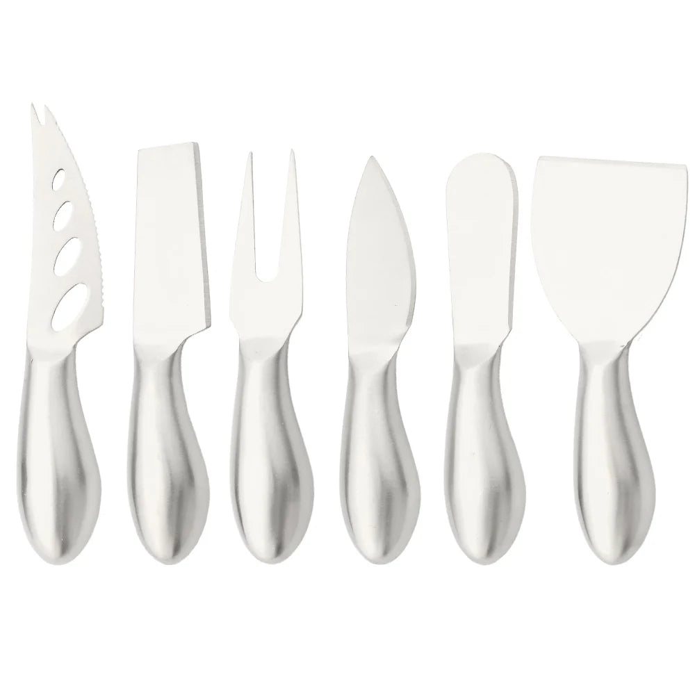 A premium Cheese Utensils Set featuring a pronged knife for semi-soft cheeses, a thin knife for slicing soft cheeses, a heart knife for cutting hard cheeses, a serving knife for elegant serving, a chisel knife for breaking crumbly cheeses, and a spreader knife for soft cheeses and pâtés. Crafted from high-quality stainless steel with ergonomic handles, these durable and easy-to-clean utensils add sophistication to any cheese platter.