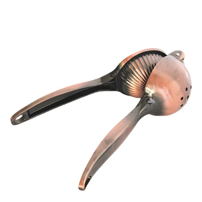 Upgrade your kitchen tools with our Antique Copper Lemon Squeezer, a sustainable and eco-friendly fruit squeezer. Crafted from durable metal, this stylish tool effortlessly extracts juice from lemons, oranges, and various citrus fruits. Its ergonomic design ensures easy handling while adding a touch of vintage charm to your kitchen decor. Say goodbye to plastic and embrace eco-conscious living with our Antique Copper Lemon Squeezer, the perfect addition to your sustainable kitchen product collection.