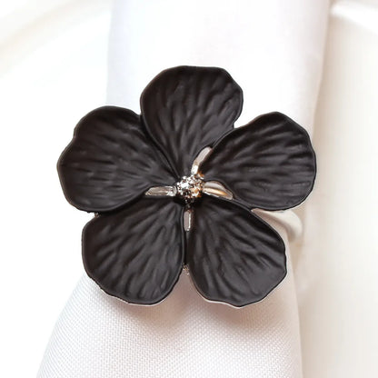 Black Blossom Napkin Ring: A luxurious and intricate tableware accessory, perfect for elevating your dining experience with style and dinnerware sophistication.