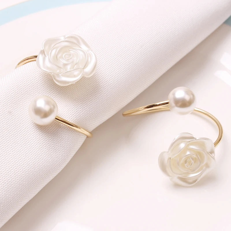 Alloy Pearl Rose Napkin Rings: Elevate your dining experience with these luxurious tableware accents featuring an exquisite rose design and lustrous pearls, perfect for adding timeless elegance to any setting.