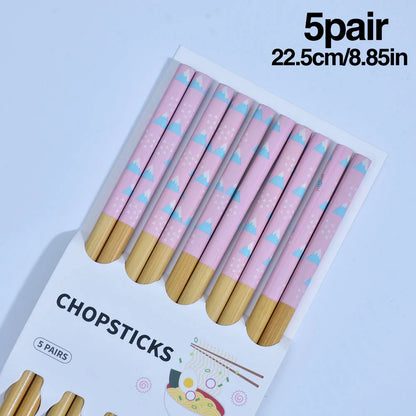 A set of high-quality wooden chopsticks featuring Korean and Chinese designs, perfect for authentic dining experiences. Available at The Lime Kitchen online shop.