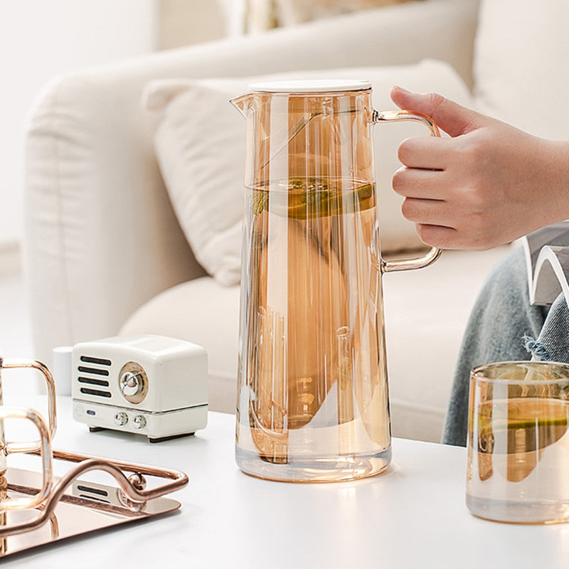 Amber Glass Jug with Cups: Elevate your beverage service with this stylish glassware set, featuring a sleek jug and complementary cups in high-quality amber glass for a perfect blend of elegance and functionality in Sydney.