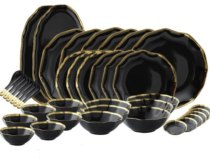 Introducing our Dinnerware Elegance Set, a modern and sleek collection in classic black. This stylish ensemble includes plates and bowls, complete with flatware and serving dishes, elevating your dining experience. The deep black hue adds drama to your table, making it perfect for both casual and formal occasions. Upgrade your table setting with the sophistication of the Dinnerware Elegance Set – where style meets practicality. Black dinnerware set in Australia