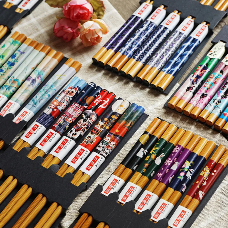 A set of high-quality wooden chopsticks featuring Korean and Chinese designs, perfect for authentic dining experiences. Available at The Lime Kitchen online shop.