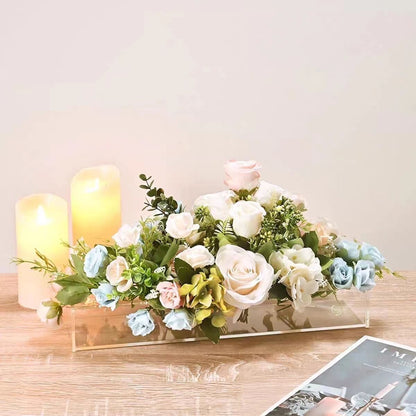 A modern, transparent Acrylic Flower Vase displaying a beautiful arrangement of flowers, seamlessly blending elegance with contemporary design in The lime shop with the best Home accessories in Australia.