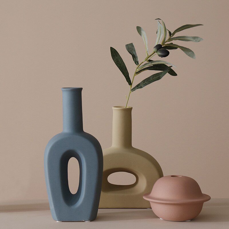 Discover the best home decor in Australia with our Ceramic Vase. Infuse your space with pastel colors, embracing an aesthetic and minimalist decor. This elegant piece effortlessly enhances your interior, offering a perfect blend of simplicity and charm.