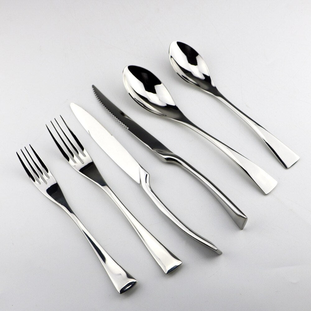 Explore elegance with our Classic Silver Cutlery Set - a sophisticated tableware collection that seamlessly blends timeless design with superior craftsmanship. Perfect for formal occasions or everyday dining, the lustrous silver finish adds a touch of sophistication. This comprehensive flatware set, featuring knives, forks, and spoons, goes beyond utility, making a statement of refined style. The set includes the Best Kitchen Knife Set, setting a new standard for elegance in every meal, best 