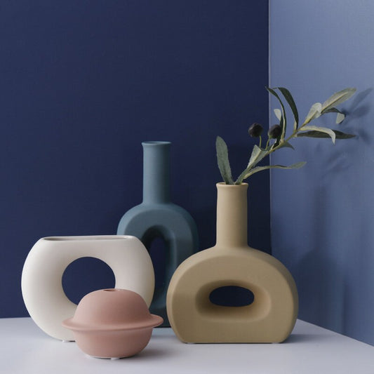 Discover the best home decor in Australia with our Ceramic Vase. Infuse your space with pastel colors, embracing an aesthetic and minimalist decor. This elegant piece effortlessly enhances your interior, offering a perfect blend of simplicity and charm.