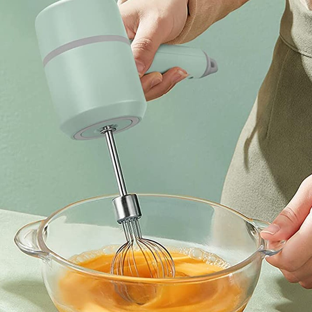 A versatile hand blender featuring a powerful motor with 3-speed regulation and a removable blending stick for easy operation. Hangable design for convenient storage and space-saving capability. Ideal for blending soups, sauces, and smoothies in any kitchen setting.